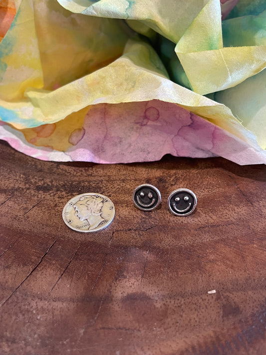 Silver smiley face stud earrings